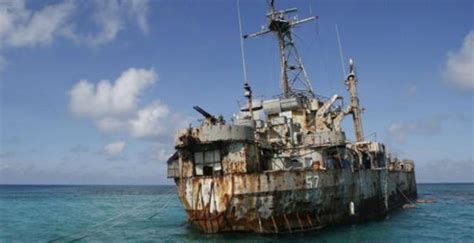 人民日报：中国完全有能力拖走赖在仁爱礁的菲律宾船_手机凤凰网