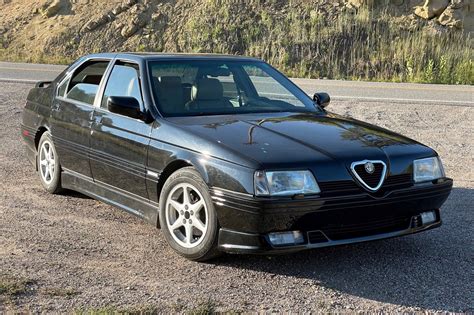 Alfa Romeo 164 Restomod Looks Gorgeous With Telephone-Dial Wheels And Carbon Bodykit | Carscoops