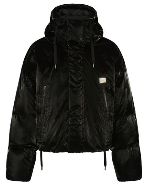 Dolce & Gabbana quilted puffer coat in Black | Stylemi