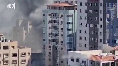 实拍加沙媒体大楼被以色列轰炸现场 建筑瞬间倾倒|加沙|半岛电视台|以色列_新浪新闻