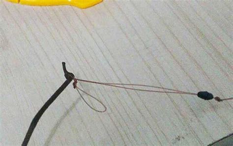 图文详解二胡千斤线的绑法 如何绑千斤-二胡教程 - 乐器学习网