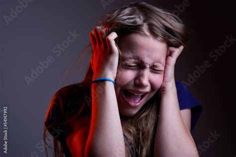 "Portrait of unhappy screaming teen girl" Stock photo and royalty-free ...