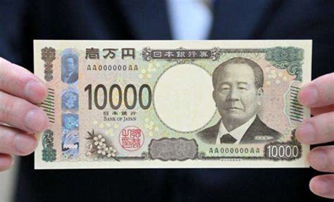 一捆捆一万日元面值的钞票图片免费下载_红动中国