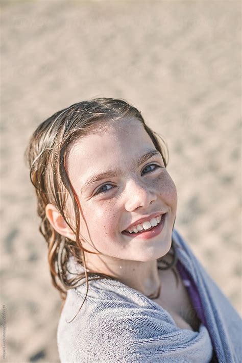 "Little Girl With Towel And Wet Hair At The Beach" by Stocksy ...