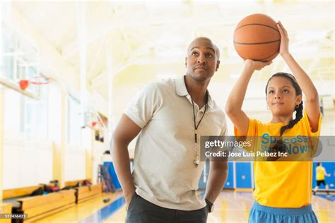 Coach Teaching Basketball Player In Gym High-Res Stock Photo - Getty Images