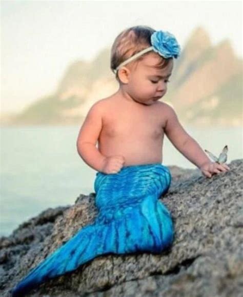 你见过怀孕的美人鱼吗? “美人鱼”妈妈和宝宝席卷海滩啦
