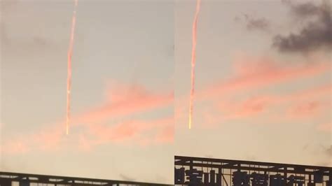 上海天空现一不明物体下坠，在天空中划出粉色的轨迹，众人看呆_腾讯视频