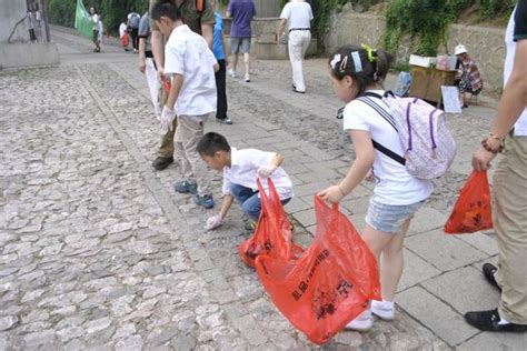 白沙镇团委组织志愿者 开展公益环保捡垃圾活动|环保|志愿者|白沙镇_新浪新闻