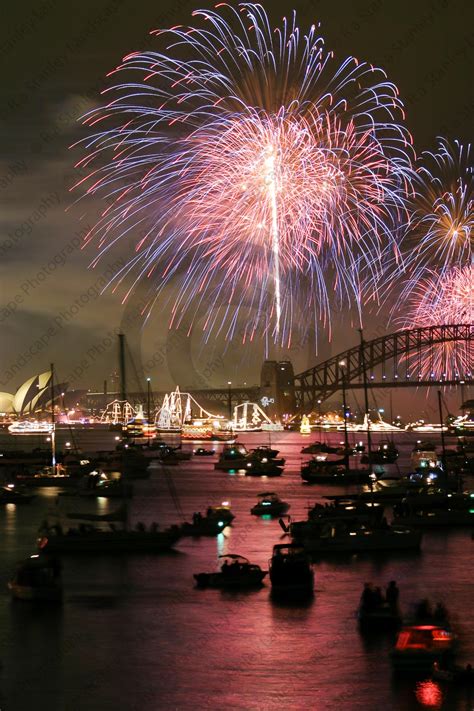 Fireworks explode over the Sydney Opera House and Harbour Bridge as ...