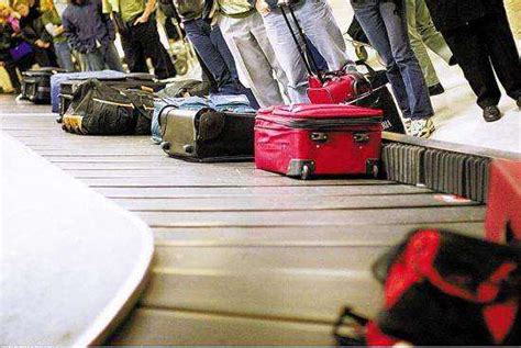 坐飞机时行李最多能带多重-百度经验