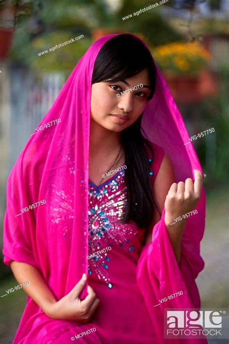 A NEWARI WOMAN in a bright pink NEPALI SARI - KATHAMANDU, NEPAL (MR ...