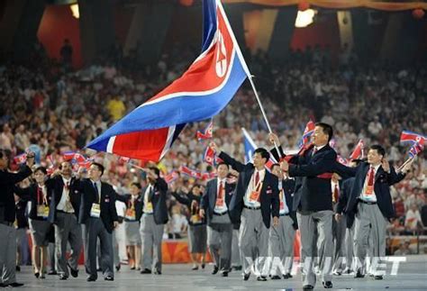 奥运会获牌朝鲜运动员回国 先瞻仰金正日太阳像-搜狐新闻