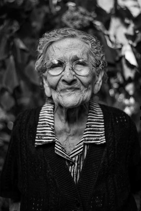 Download Portrait Of A Mature Old Woman Wallpaper | Wallpapers.com