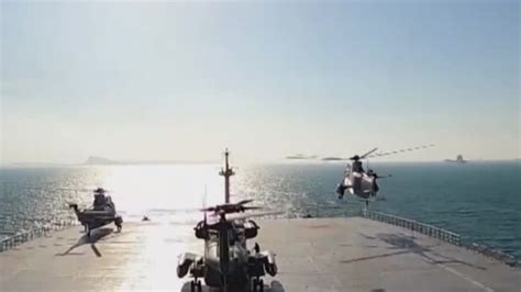 南海又爆发“冲突”？两国军舰火速前往，大批士兵持枪“对峙”_腾讯视频
