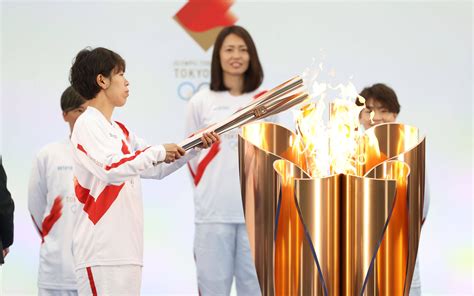 东京奥运圣火抵达日本 26日将开始火炬接力传递