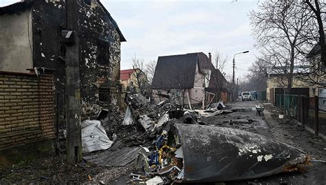 战火下的乌克兰老百姓 被俄军损坏的家园__财经头条