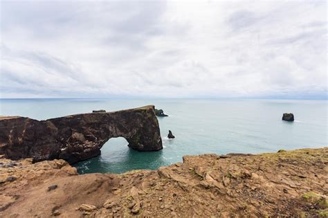Premium Photo | Volcanic arch on dyrholaey promontory in iceland
