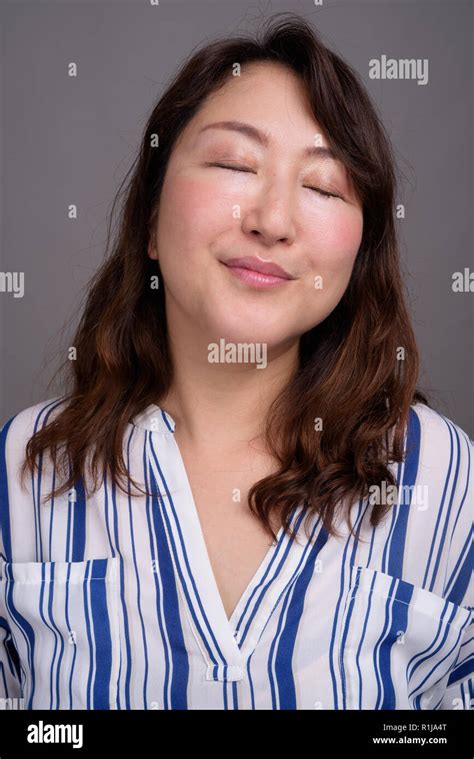 Japanese mature woman face hi-res stock photography and images - Alamy