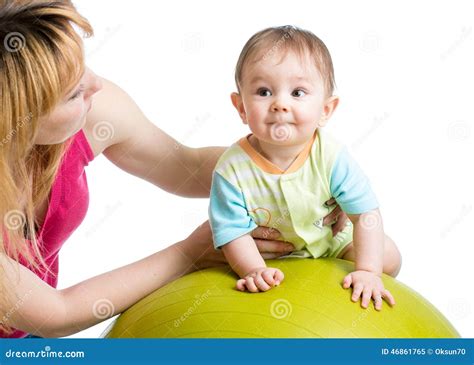 Mother Doing Gymnastics with Baby on Fit Ball Stock Image - Image of ...